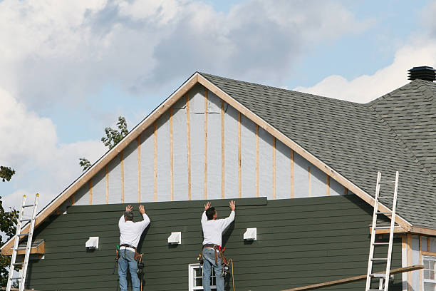 Professional Vinyl Siding technician working in Fayetteville, NC